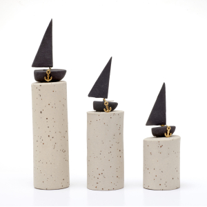 Black boats on a white base charm
